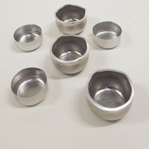 Six Multiple Thickness Deep Drawn Aluminium Cups, with Earing Profiles