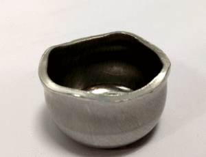 4mm deep drawn aluminium cup with a four peak earing profile