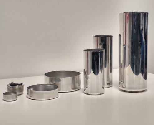 7 drawn aluminium cups, with earing profiles