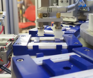 Automated Lateral Flow Test Assembly System Using Pick and Place Automation to place top lateral flow test top housing